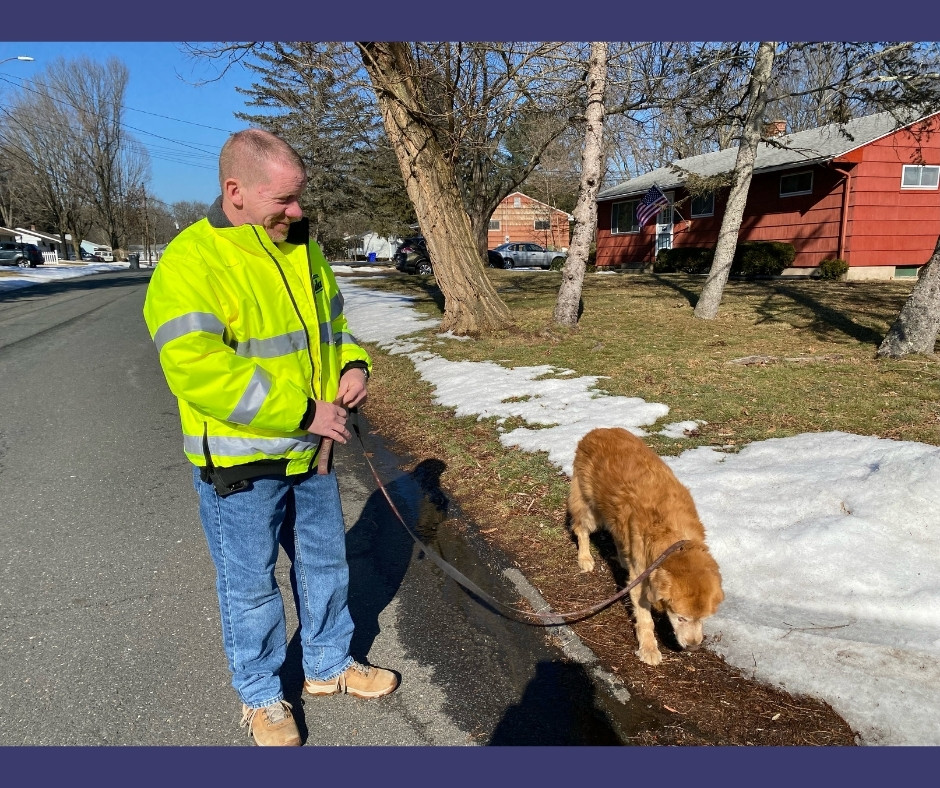 Bob Hendrickson walking his dog